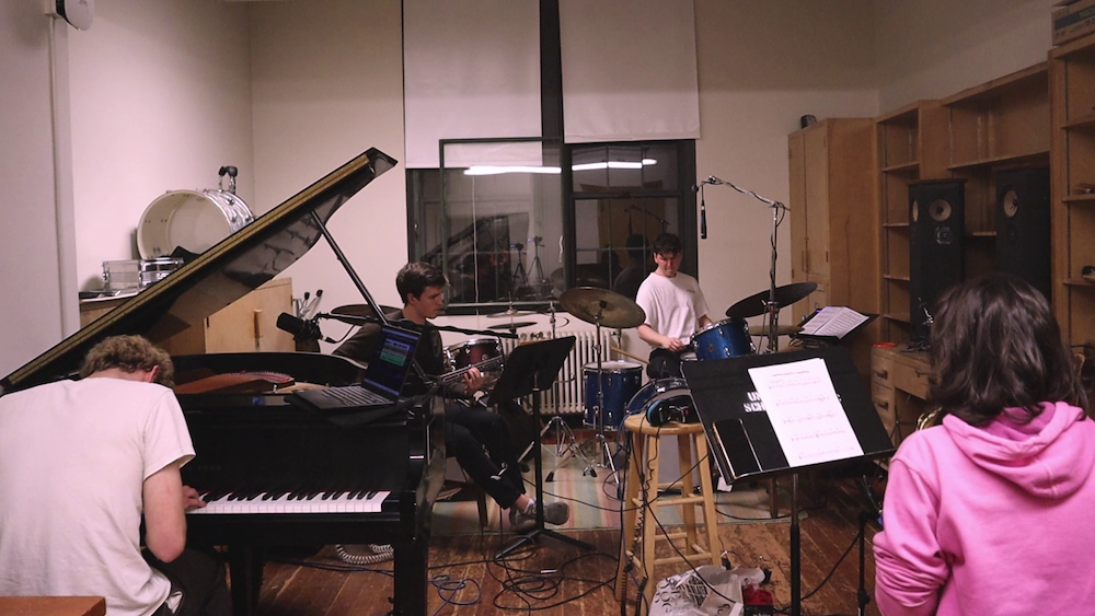 A picture of the Regular Movements quartet recording pieces for the choir of heirs podcast score